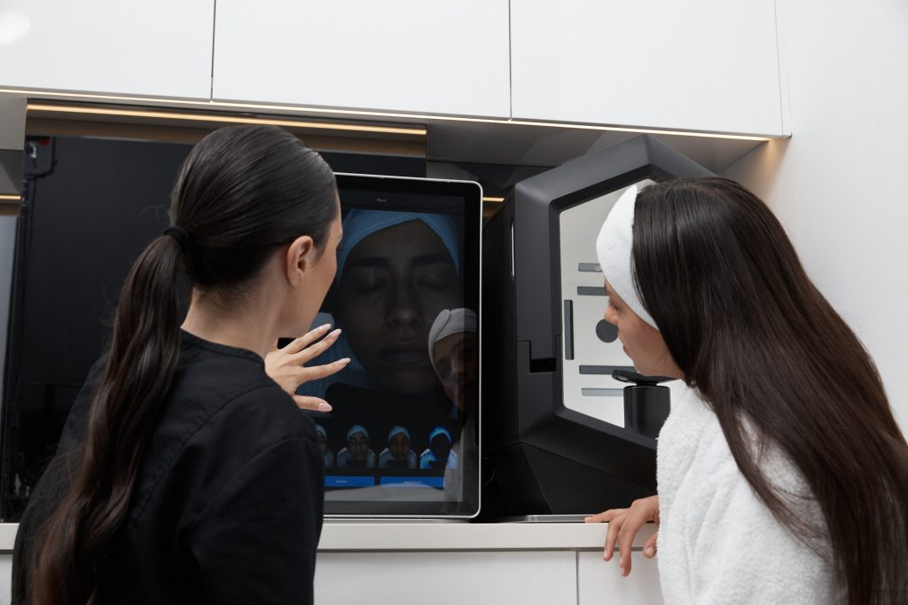 Client undergoing advanced skin analysis at Body Sculpting Clinics Sydney to identify pigmentation, dehydration, and other skin concerns.