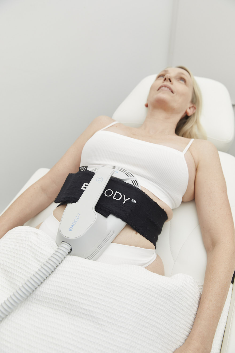 EmBody device delivering muscle stimulation to abdominal muscles.