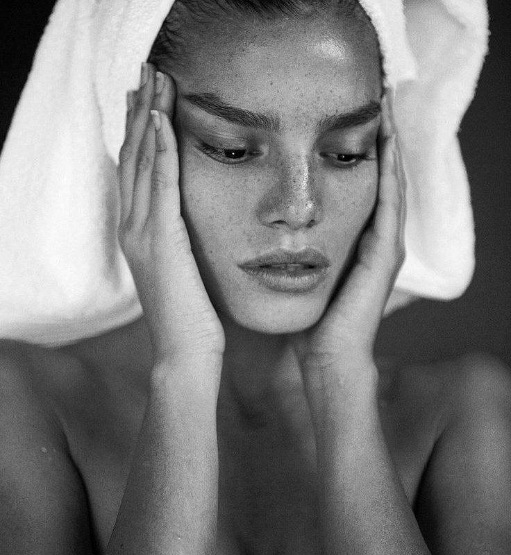 Smooth, radiant skin with a soft glow.