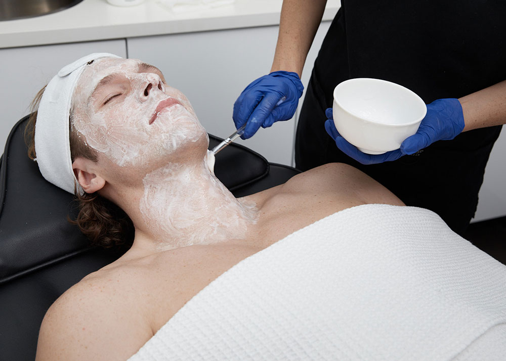 Client undergoing customised skin treatment to prevent blackheads.