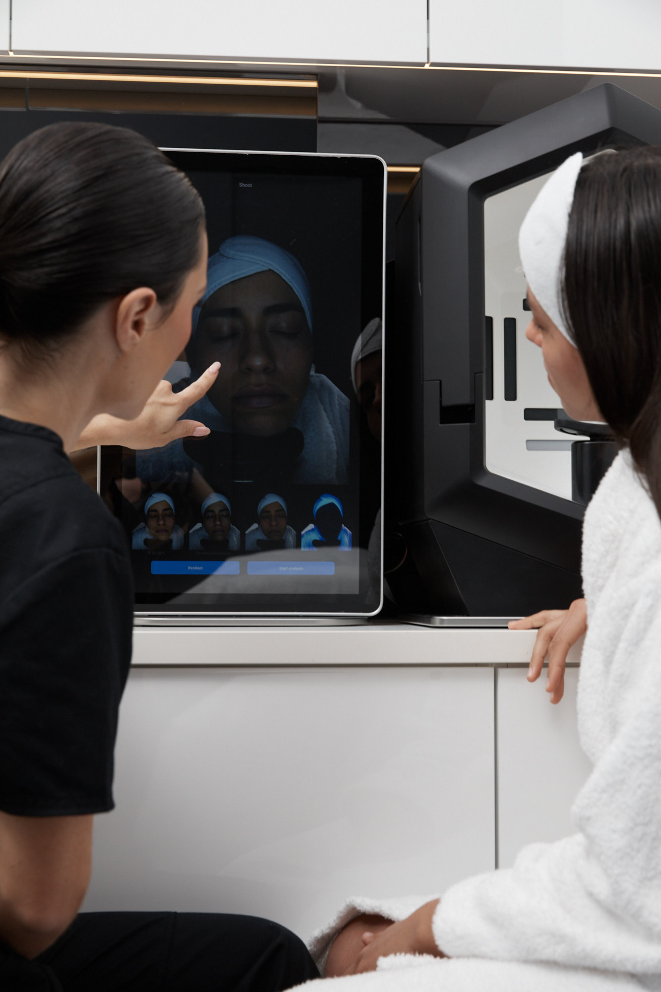 Clinician conducting a digital skin analysis assessment screen consultation to evaluate pore size, oil production, and texture at Body Sculpting Clinics Sydney.