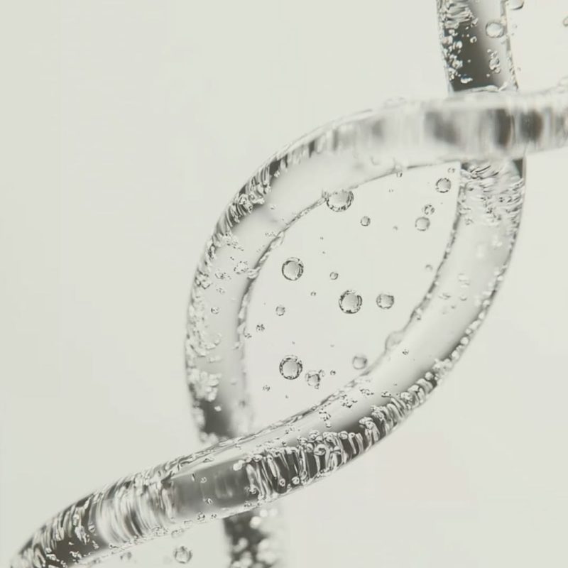 Clear, gel-like double helix structure representing DNA repair and peptide science in skincare.